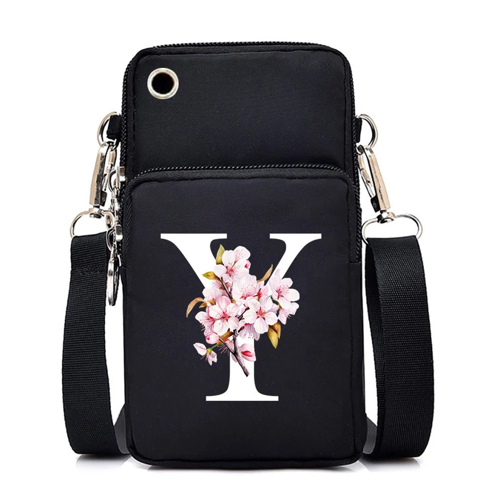 Sakura alphabet floral graphics small crossbody bag for women, with a mobile phone pocket and stylish messenger design.