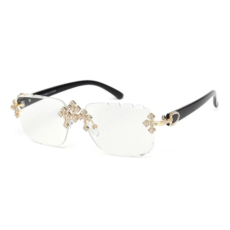 Luxury rimless square sunglasses for women with rhinestone accents, UV400 protection, fashionable cut lenses, and trendy diamond details.