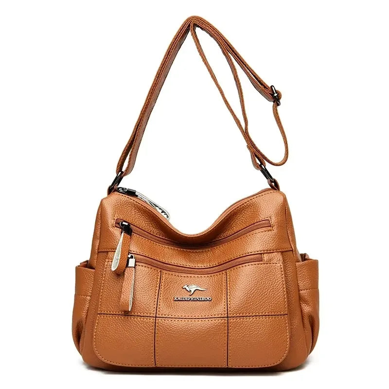 Genuine soft PU leather handbag for women featuring a vintage shoulder tote design, large capacity, luxury style, and elegant craftsmanship.