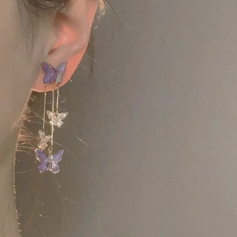 Purple butterfly drop earrings with rhinestone details by HSF Marketplace