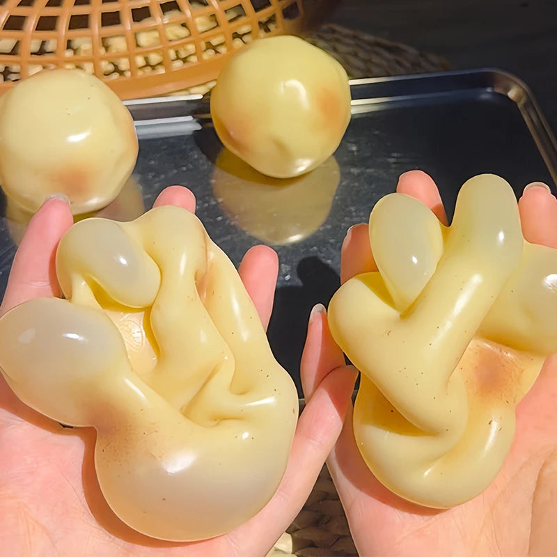 Soft squishy potato stress ball from HSF Marketplace, a sensory fidget toy with a smooth, no-rebound plastic feel for stress relief and ASMR.