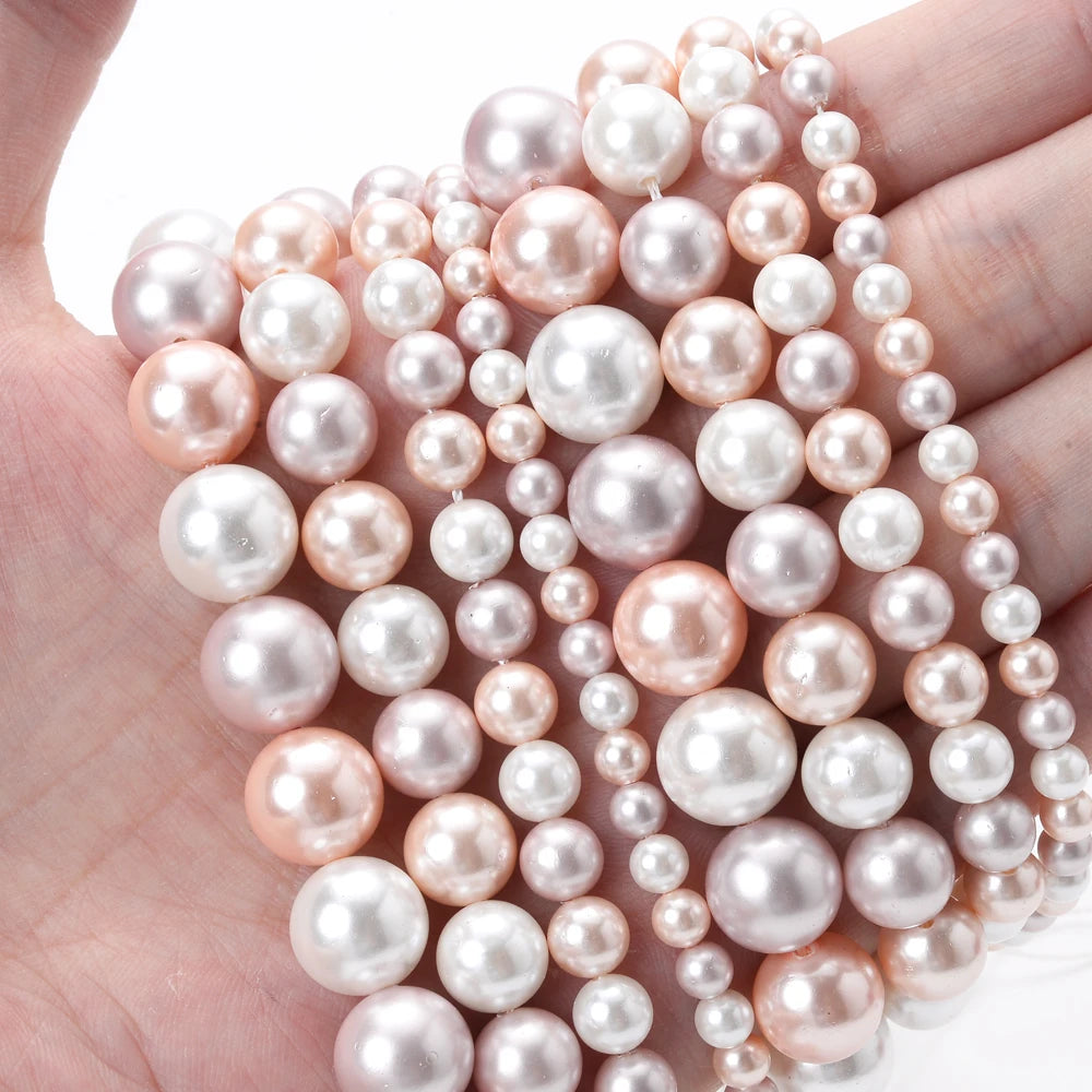 Natural freshwater shell pearls beads for jewelry making, HSF hair styling tools product; white round beads displayed