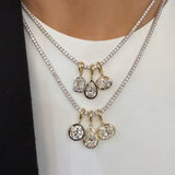 Elegant women's geometric zircon pendant necklace by HSF Marketplace on a simple background