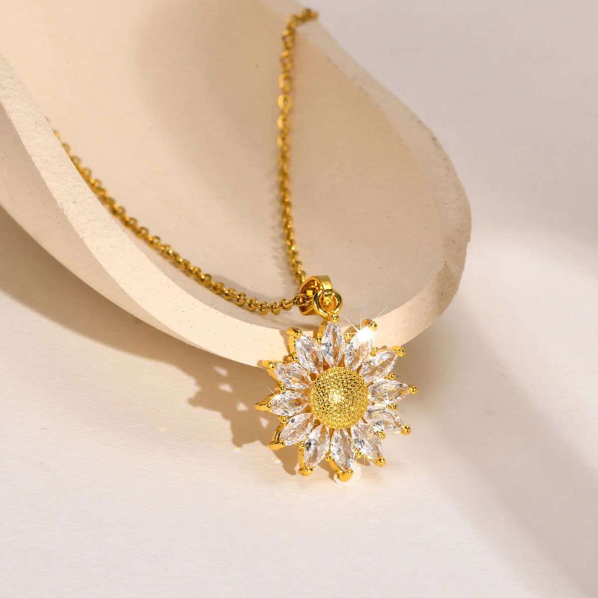 Stainless steel spiral sunflower pendant necklace for women, 18K gold plated, stackable boho jewelry, waterproof fashion accessory.