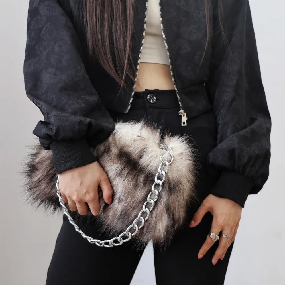 Luxury leopard print handbag by HSF Marketplace featuring a soft chain shoulder strap and large capacity underarm design.