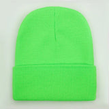 Women's soft knitted winter beanie in a versatile unisex style, available in 24 colors
