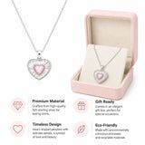 Pink heart crystal halo sunburst pendant necklace for women, elegant fashion jewelry featuring sparkling crystals and a delicate chain.