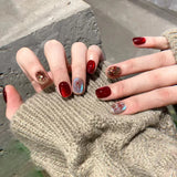 24-piece cute girly short square false nails with white French tips, glitter stars, rhinestones, bows and cat-eye accents