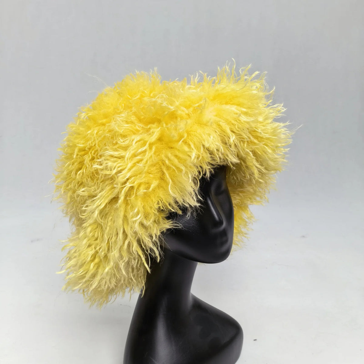 Women's faux wool curly fur bucket hat by HSF Marketplace in a trendy, textured design