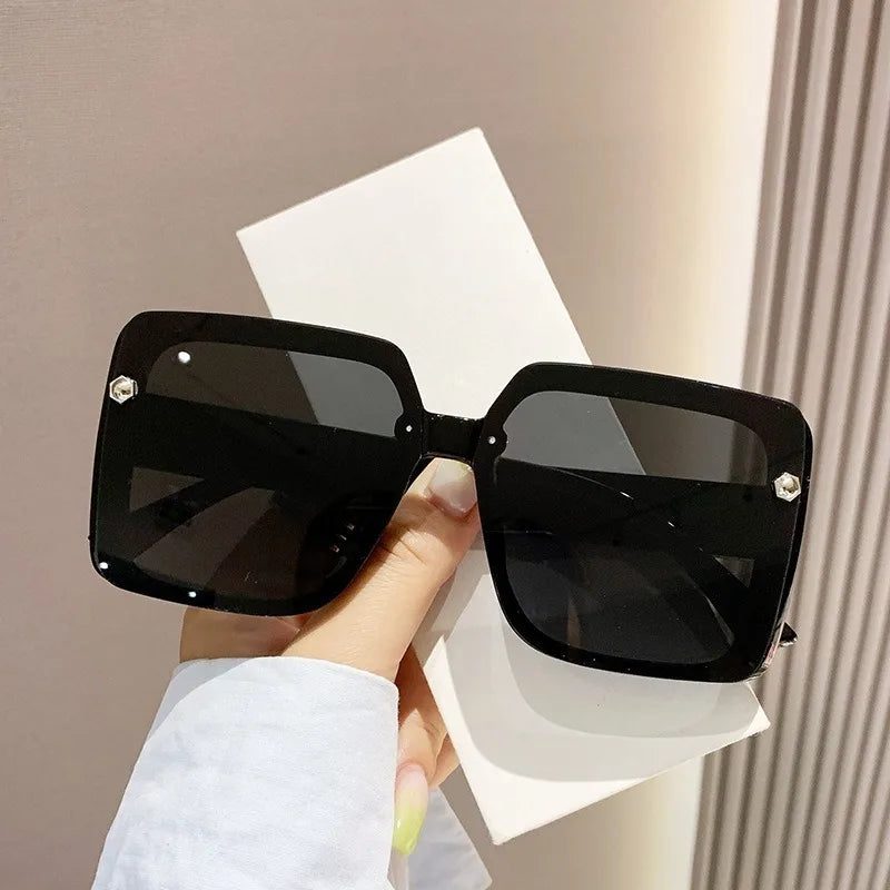 Vintage women's square sunglasses with large frames, retro style, HSF Marketplace, stylish shades for female fashion.