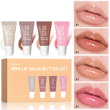 Set of four HSF Marketplace mirror lip glosses with vanilla, pink sugar, and coffee cake scents, featuring transparent shine and moisturizing formula.