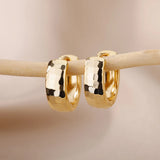 Gold stainless steel small hoop earrings for women by HSF Marketplace