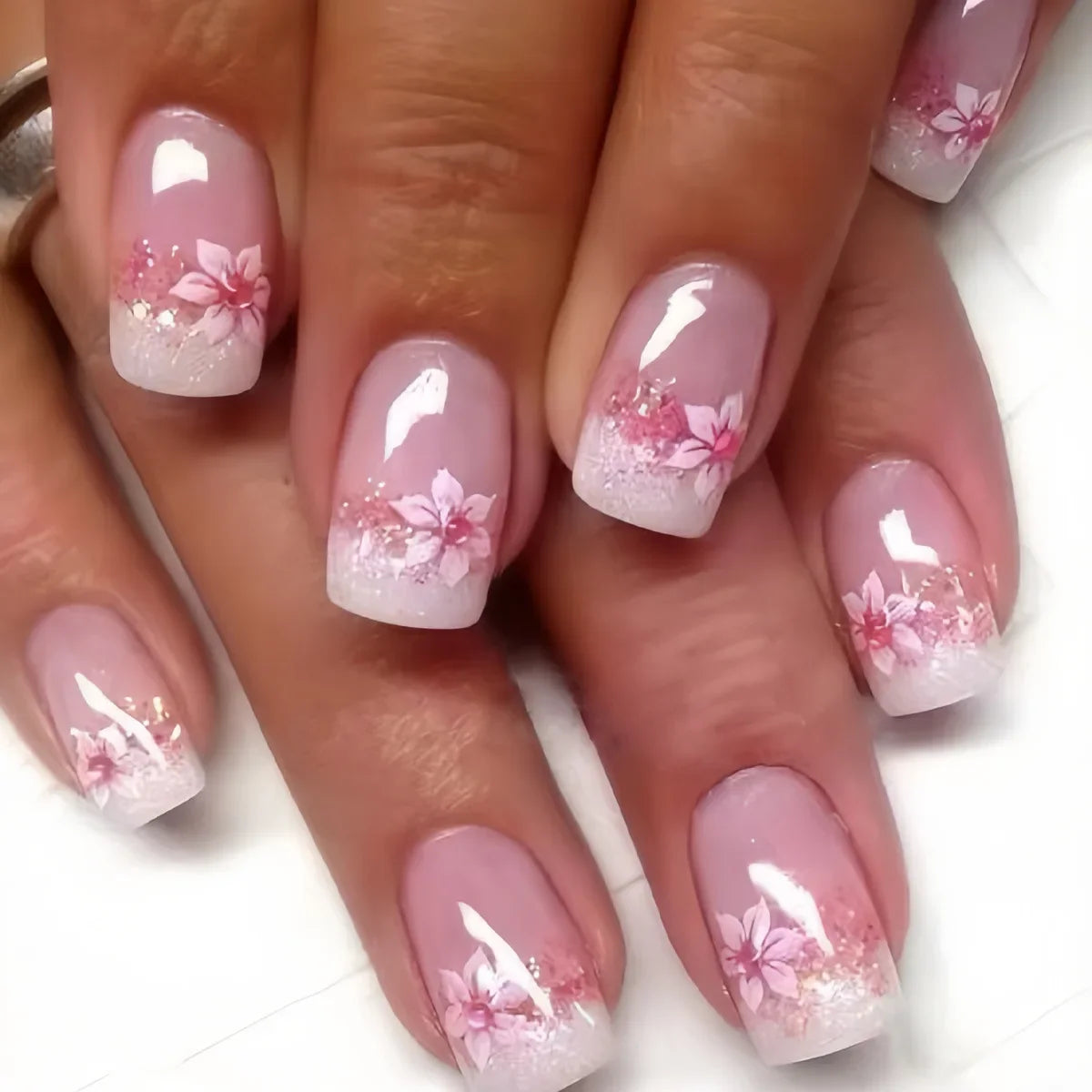 24-piece short almond press-on false nails with pink floral French tips, glossy full-cover design by HSF Marketplace