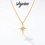 Gold stainless steel North Star pendant necklace for women with zircon accents, waterproof jewelry, eight-pointed star design.