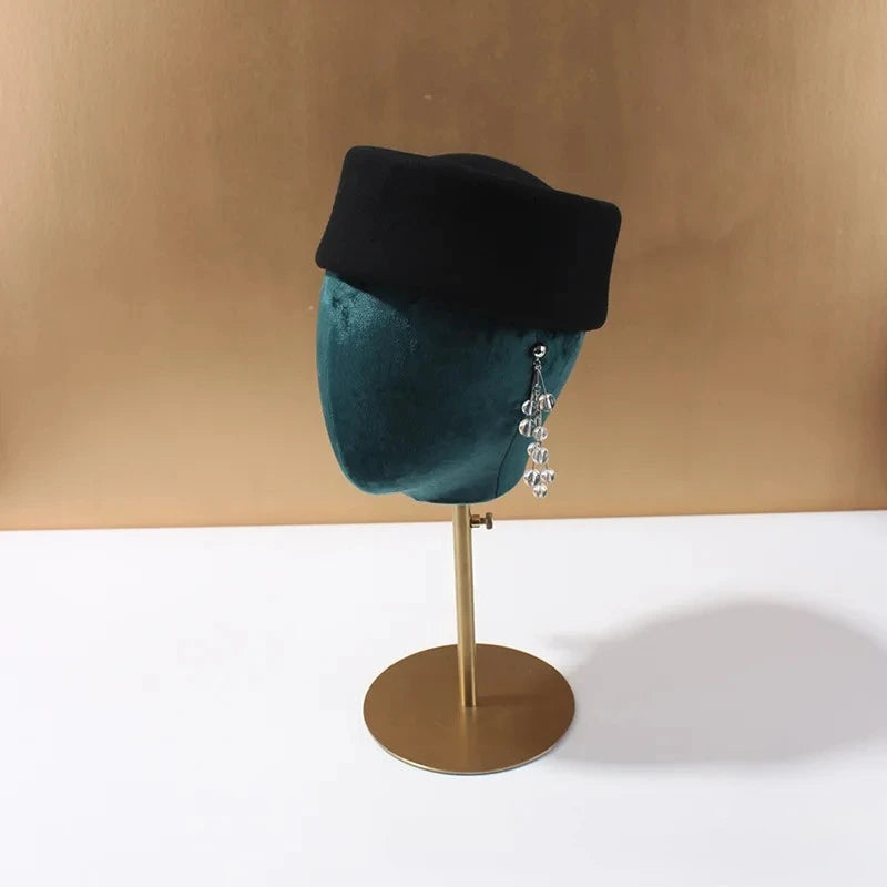 Women's wool felt beret hat by HSF Marketplace with vintage hard concave top, fascinator style, and pillbox design