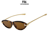 Trendy women's vacation cat eye sunglasses with UV400 protection, black frames, and fashionable design.