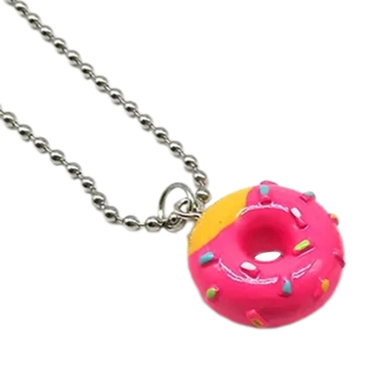 Acrylic mini donuts pendant necklace by HSF Marketplace featuring a fun choker-style chain and colorful donut charms.