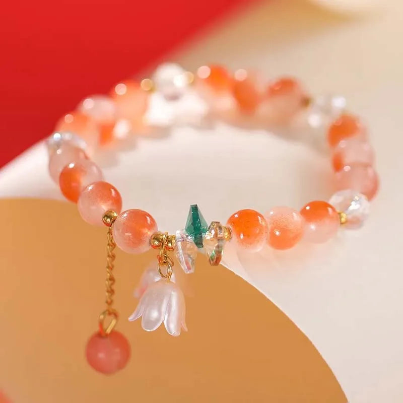 Colorful Lily Valley flower bracelet for women featuring crystal stones and elastic bead design, ideal for wedding or birthday jewelry.