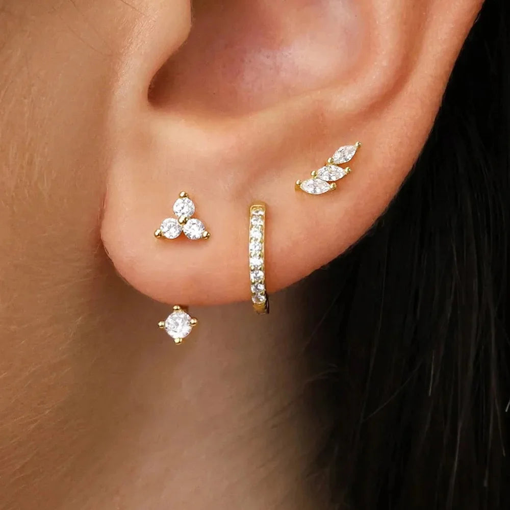 3 pairs of zircon little huggies hoop earrings in stainless steel, featuring unique cartilage piercing designs for women