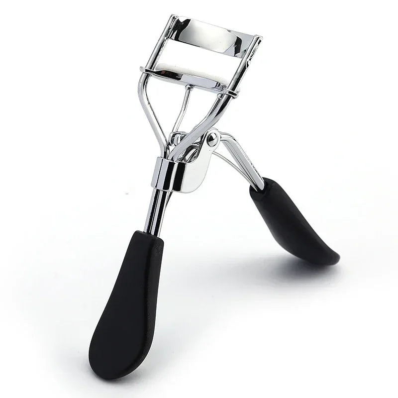 HSF Marketplace false eyelashes with multicolor eyelash curler and lash lift tool for professional cosmetic makeup application.