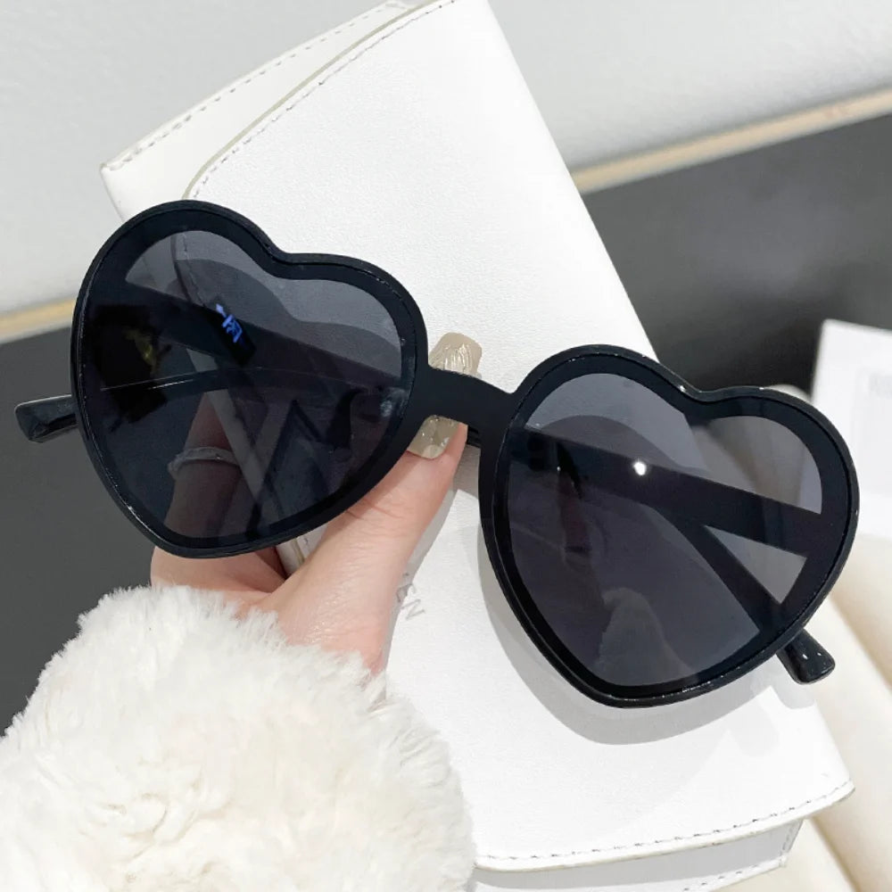 Pink love heart-shaped sunglasses for women with big frame design, UV400 protection, vintage style, outdoor fashion eyewear by HSF Marketplace