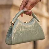 Half Moon evening handbag for women in black PU leather, stylish clutch bag for wedding and party occasions.