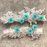 2-piece bridal thigh garter set with pearl flower embroidery and elastic leg loops for weddings and parties