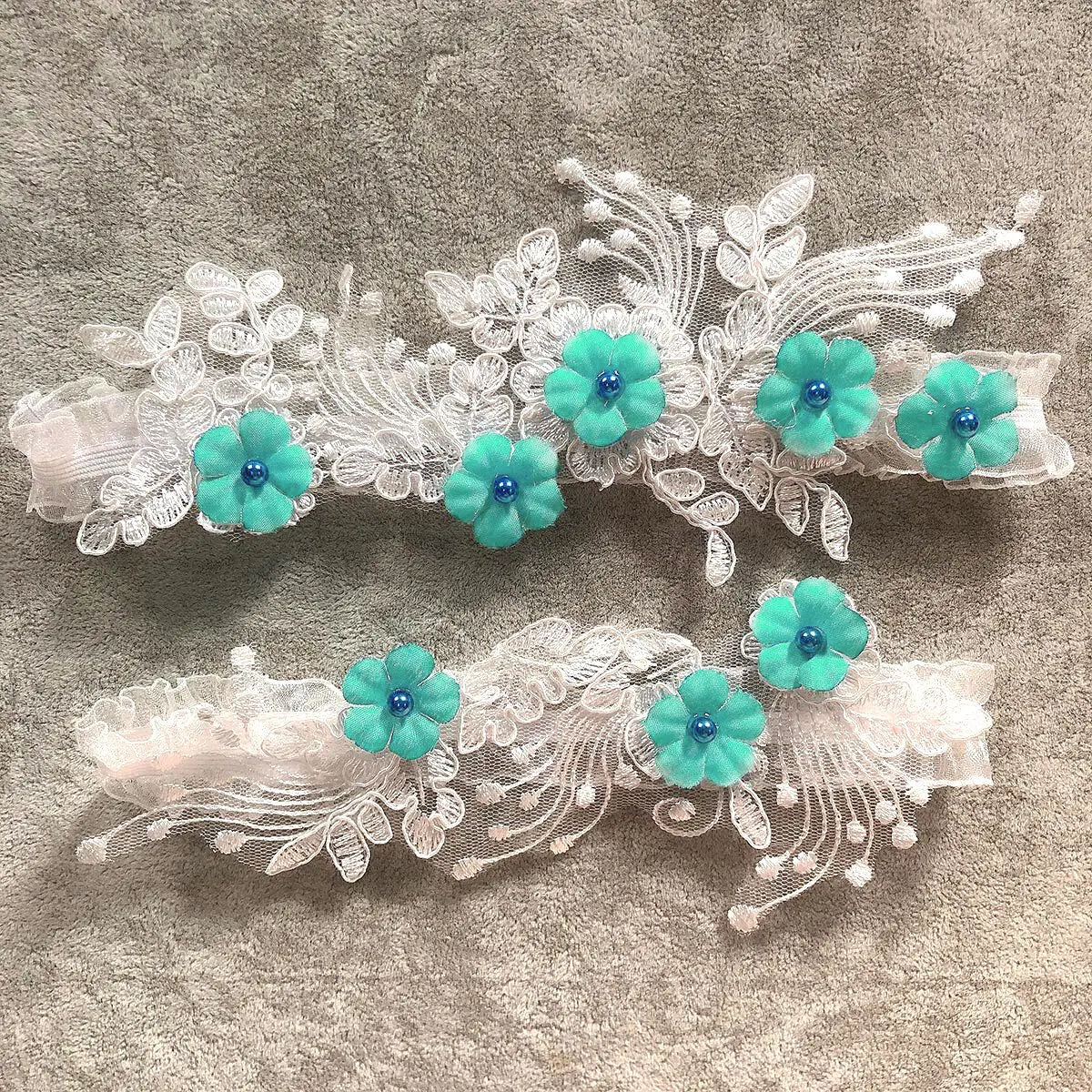 2-piece bridal thigh garter set with pearl flower embroidery and elastic leg loops for weddings and parties