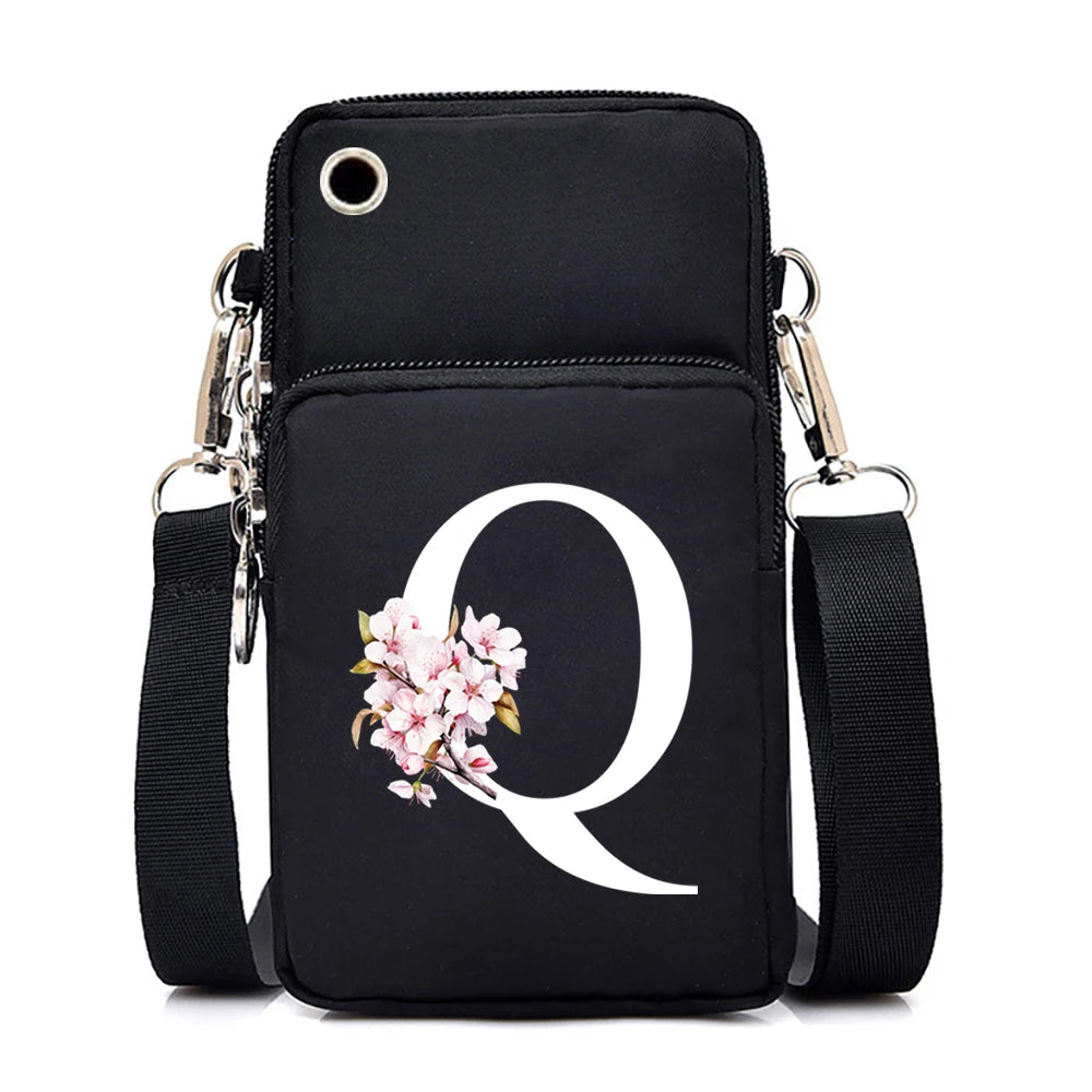 Hanging small crossbody bag with Sakura alphabet and floral graphics, featuring a mobile phone compartment and adjustable strap.