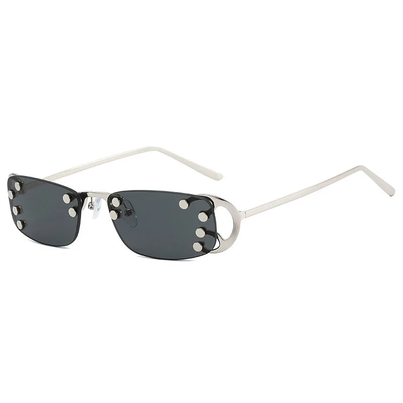 Holographic rimless metal frame sunglasses with studded accents, rectangular UV400 Y2K shades perfect for daily wear or parties.