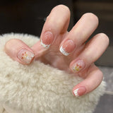 24-piece cute girly short square false nails with white French tips, glitter stars, rhinestones, cat eye, and bows