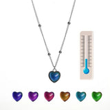 Heart-shaped mood locket necklace by HSF Marketplace featuring color-changing, temperature-sensitive stainless steel jewelry with love-themed pendant