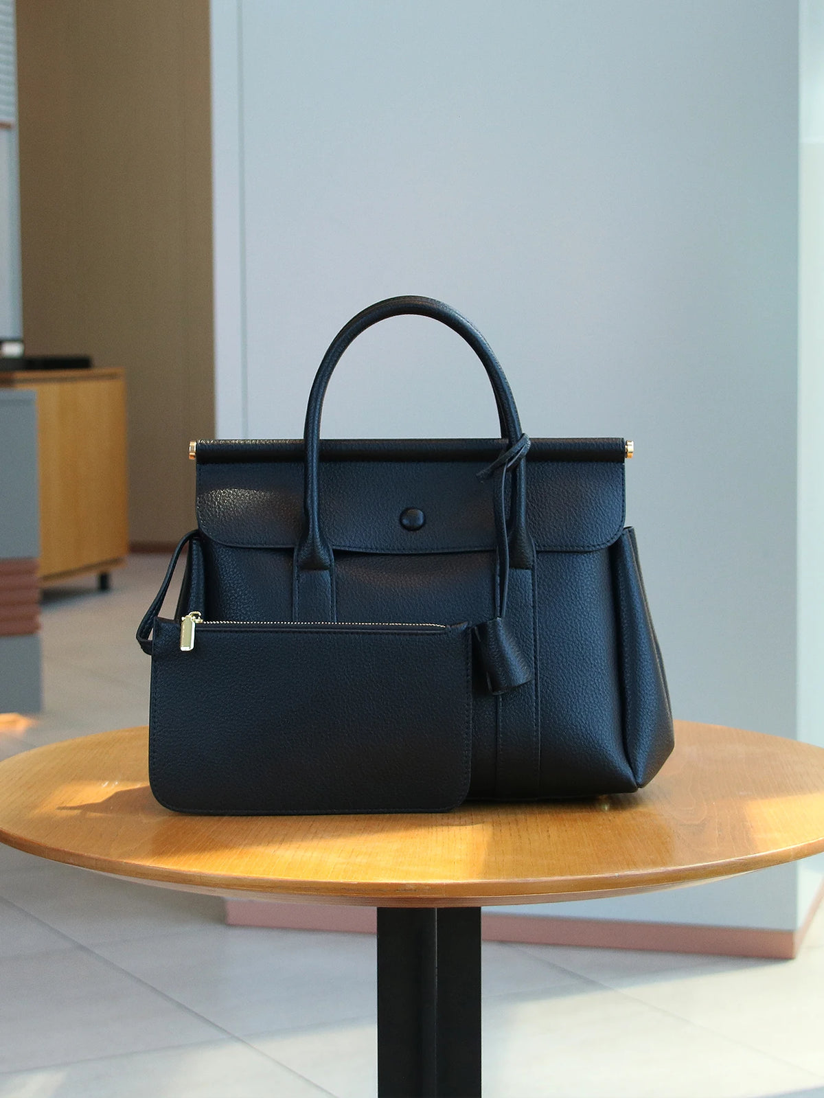 Vintage women's handbag by HSF Marketplace featuring a soft leather flap design, ideal for office and daily commute.