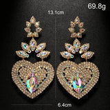 Exaggerated heart dangle earrings by HSF Marketplace for weddings and parties