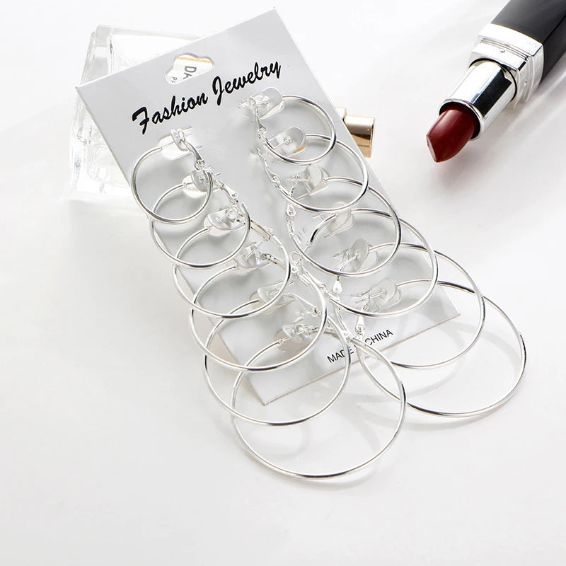 Set of 12 pairs of simple punk style hoop earrings in large round designs for women and girls, featuring oversized jewelry hoops.