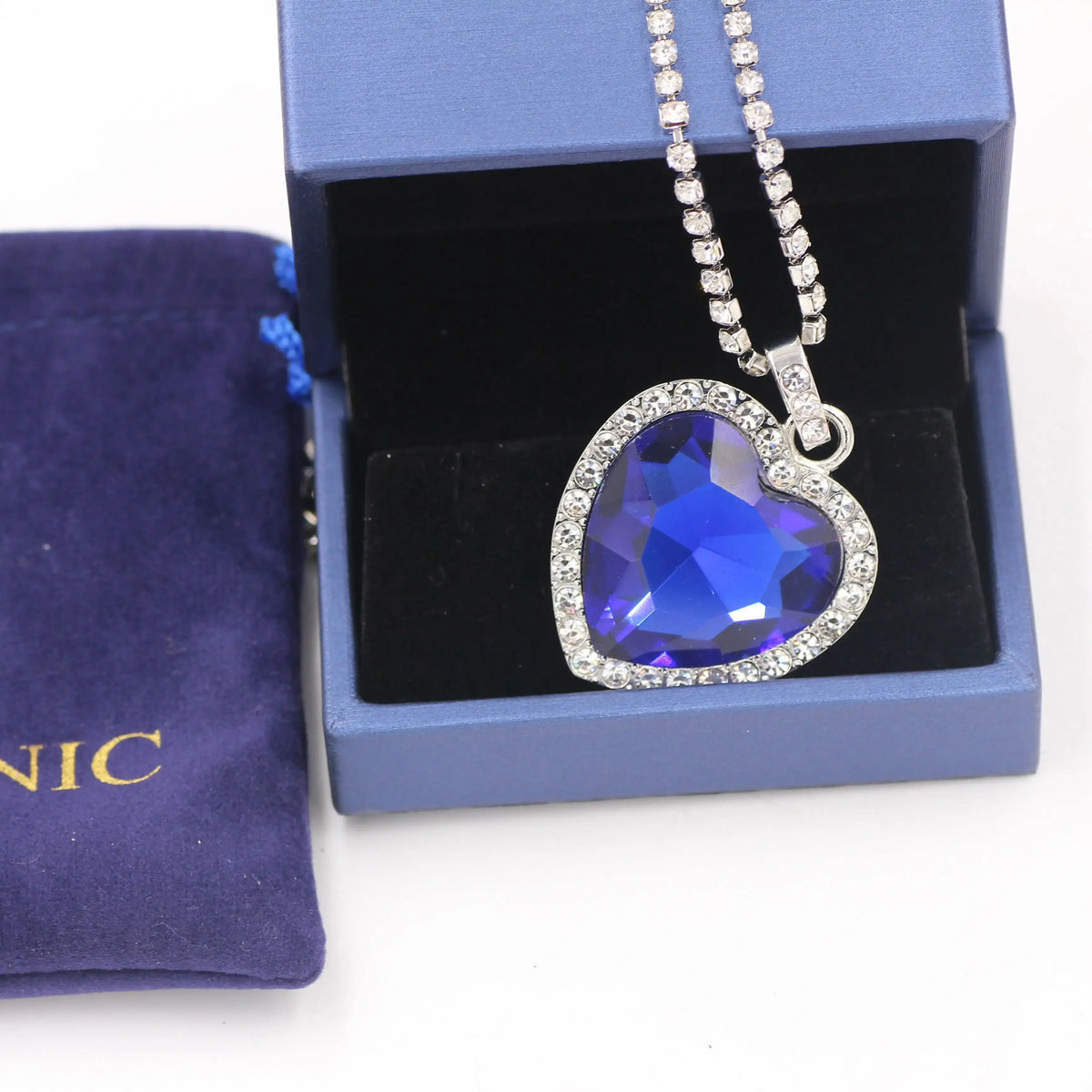 Titanic Heart of Ocean blue heart pendant necklace by HSF Marketplace, featuring a love-themed jewelry design with velvet bag.