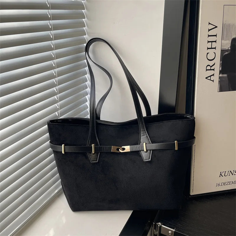Leopard print shoulder tote bag with brown faux leather trim, gold lock detail, spacious design for women’s work and daily use.