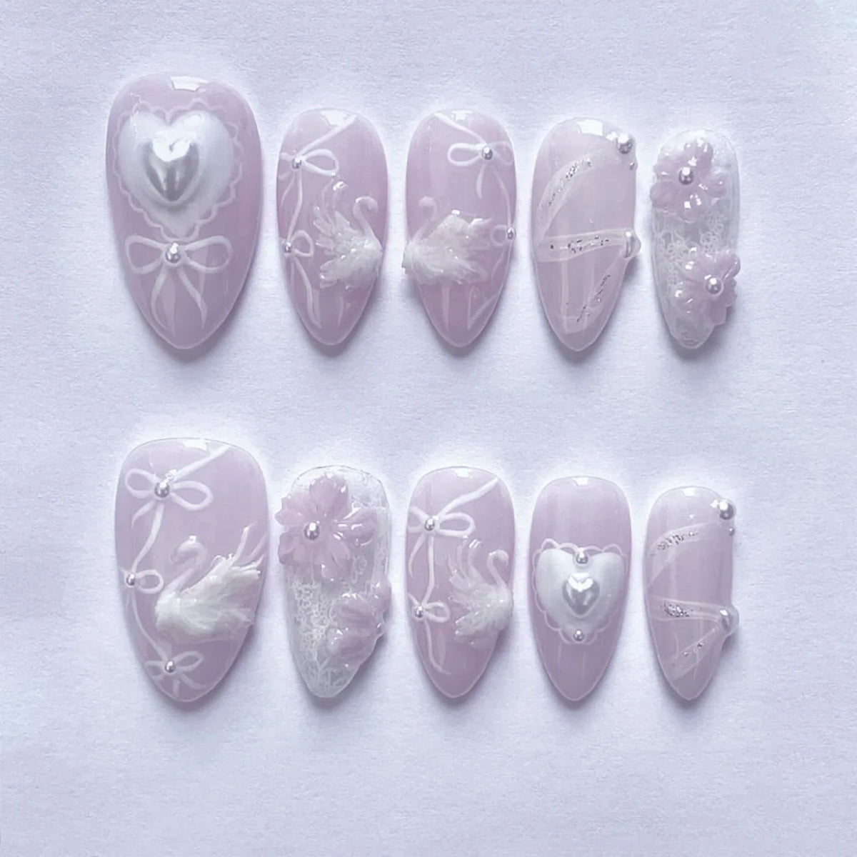 Pink almond false nail patches with bowknots, love hearts and pearl design, 24-piece detachable press-on nails