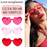 Women's heart-shaped sunglasses in multiple colors, perfect for weddings, parties, and photo props by HSF Marketplace.