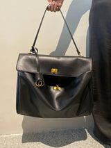 Large capacity women's split leather tote bag in a structured design with dual handles for everyday use