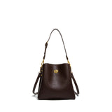 Elegant burgundy PU leather women's handbag with large capacity, bucket style, shoulder strap, and stylish design.