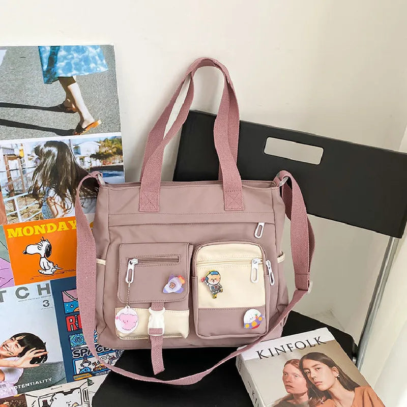 Waterproof canvas women's handbag with shoulder strap, tote style, nylon material, Oxford design, crossbody option, versatile satchel bag