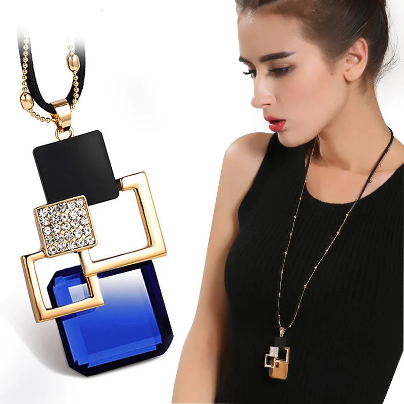 Long geometric chain necklace for women featuring a statement pendant, stylish maxi jewelry accessory from HSF Marketplace.