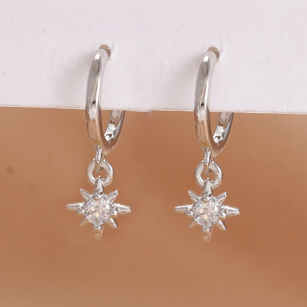 Stainless steel star dangle earrings with sparkling zircons by HSF Marketplace