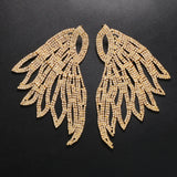 Oversized rhinestone wing drop earrings by HSF Marketplace for women, featuring sparkling silver-tone wing designs