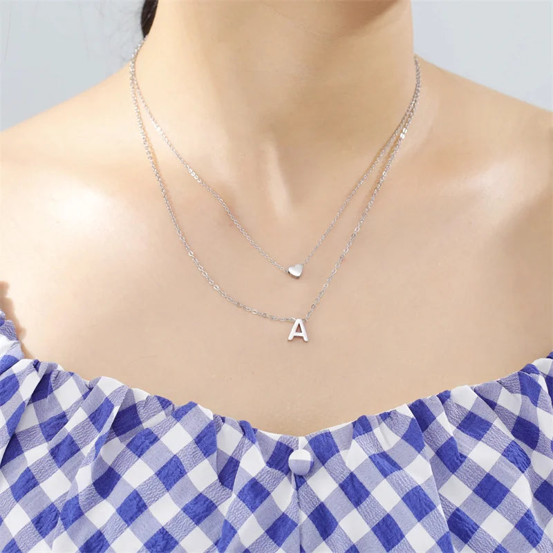 Tiny heart initial necklace for women, gold and silver layered charm jewelry by HSF Marketplace