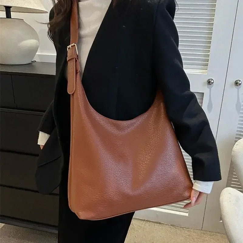 Leather tote bag for women by HSF Marketplace featuring a large, high-capacity shoulder handbag in a simple, stylish design.