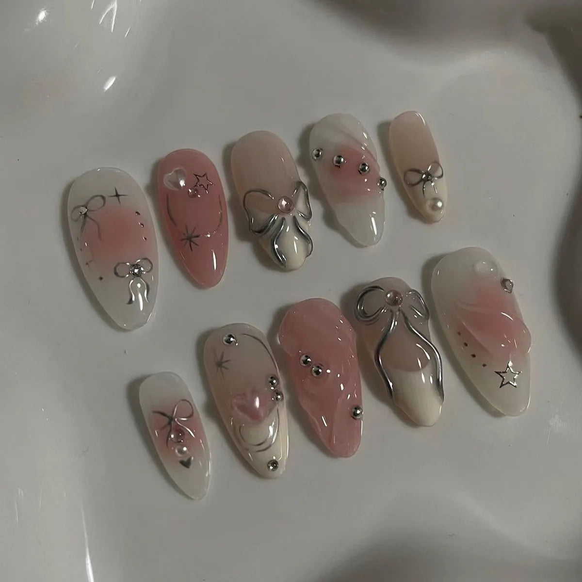 24pcs pink almond Korean press-on false nails with bowknots, love hearts, and pearl design by HSF Marketplace