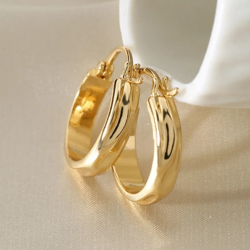 Gold-plated stainless steel round hoop earrings for women by HSF Marketplace