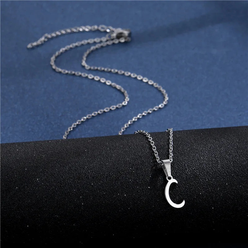Shiny stainless steel initial letter pendant necklace for women, featuring a simple clavicle chain choker jewelry.